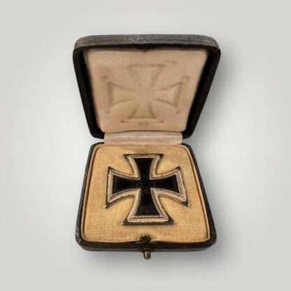 An original Iron Cross 1st Class By Wächtler & Lange with presentation case, with a nice blackened magnetic iron core and ribbed border.