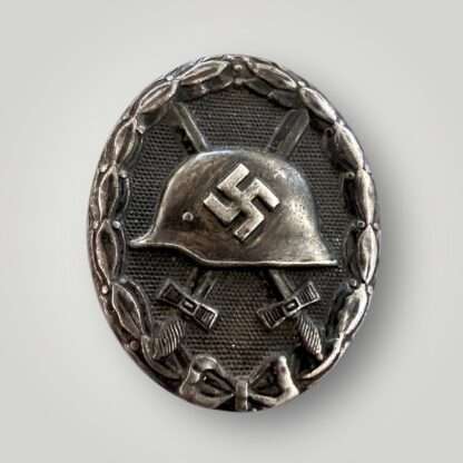 An original WW2 German Wound Badge Black 1939 By Rudolf Wachtler & Lange, die-stamped in steel with nice factory paint finish