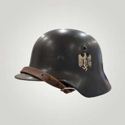 A WW2 German M35 Heer Single Decal helmet, with leather strap.