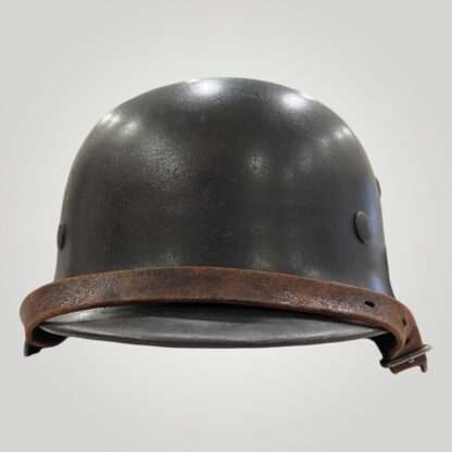 A WW2 German M35 Heer Single Decal helmet, with leather strap.