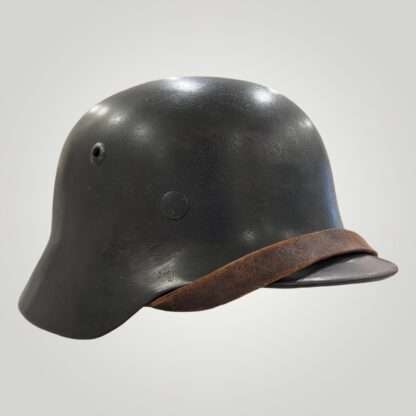 A WW2 German M35 Heer Single Decal helmet, with leather strap.