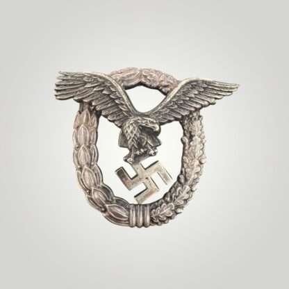 A desirable Luftwaffe Pilots Badge By Gebr Wegerhoff GWL, the eagle is constructed in nickle silver with a tombac wreath with nice patina and polished edges.