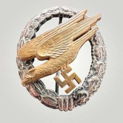 An early Luftwaffe Fallschirmjäger Badge by Assmann, constructed in tombak.