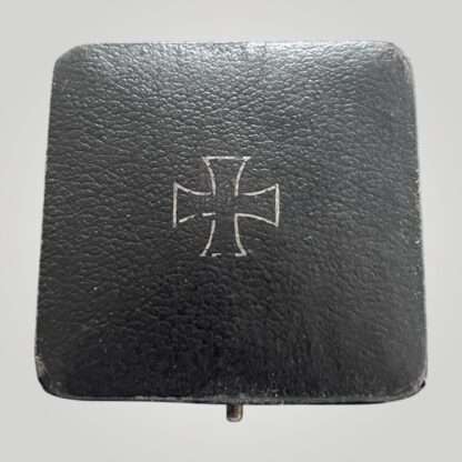 An original WW2 German Iron Cross case embosed with iron cross.