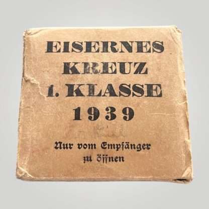 A WW2 German Iron Cross 1st Class box marked Eisernes Kreuz 1. Klass 1939.