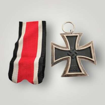 A German WW2 Iron Cross EK2 1939 by Jakob Bengel Oberstein, three part contruction with magnetic iron core with original factory paint finish.