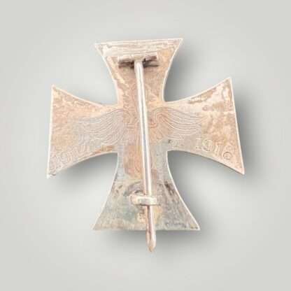 Reverse image of a WW1 German Iron Cross engraved 1914 and 1918 on each arm with Imperial Air Force motif in the centre.