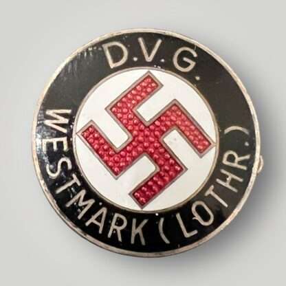 A DVG Westmark (Lothr.) By W.Redo Party Pin (Deutscher Volksgenossen Bund Mitgliedsabzeichen). Constructed in black, red, and white enamel.