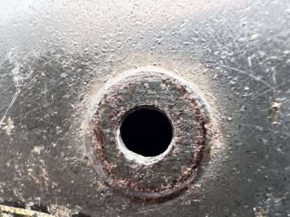 A close up image of a air vent for a German WW2 M35 helmet.