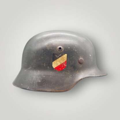 A side view of a German WW2 M35 Luftwaffe helmet.