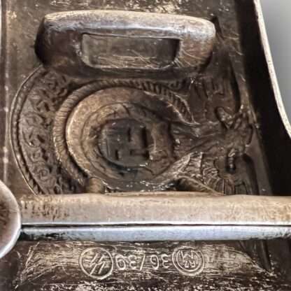 Reverse image of an Waffen-SS EM/NCOs belt buckle by RZM36/39, die struck alluminium.