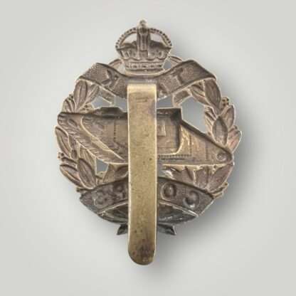 Reverse image of an British WW1 Royal Tank Corp cap badge, constructed in brass.