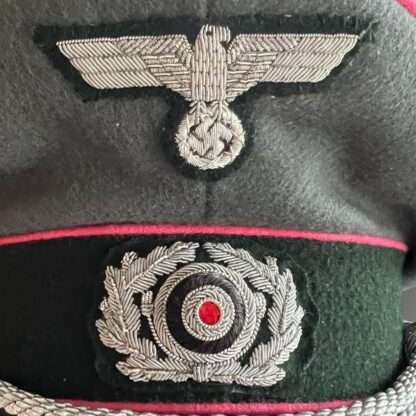 Close up image of insignia for a WW2 German (Heer) Panzer Officers visor cap.