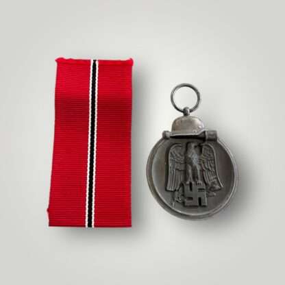 An original Eastern Front Medal, constructed in zinc with nice long ribbon.