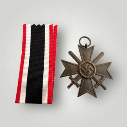 An earlty original German WW2 War Merit Cross With Swords 2nd Class by Moritz Hausch.