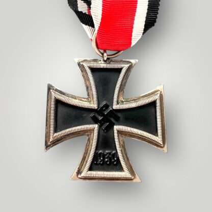 An early Iron Cross 1939 EK2 By Otto Schickle, three part contruction with magnetic iron core with nice factory paint finish.