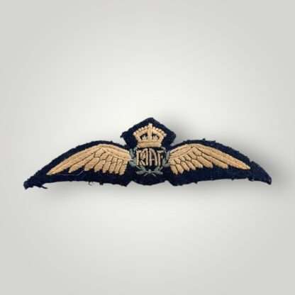 A genuine Royal Australian Air Force WW2 Pilots Wings, embroidered with outstretched wings padded with a central wreath encircling the 'RAAF' monogram with the King's crown above.