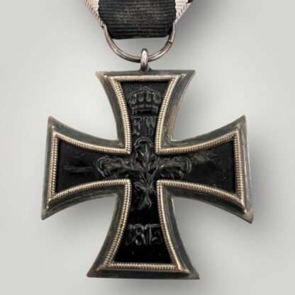 Reverse imagecof an Imperial WW1 Iron Cross 2nd Class 1914 by KO, three-part construction.