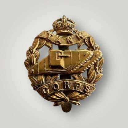 An original British WW1 Royal Tank Corp cap badge, constructed in brass.