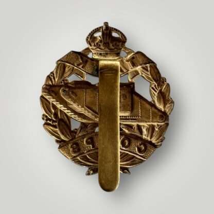 Reverse image of an original British WW1 Royal Tank Corp cap badge, constructed in brass.