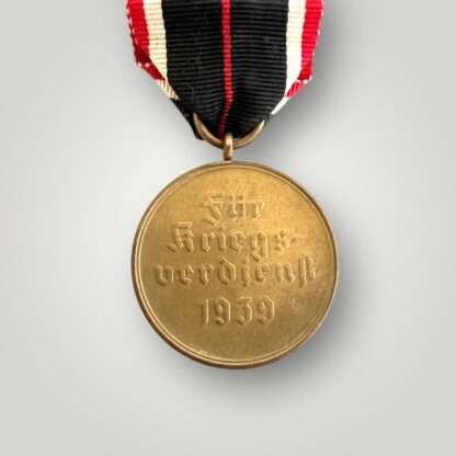 Reverse image of a War Merit Medal 1939 (Kriegsverdienstmedaille), die struck in bronze.