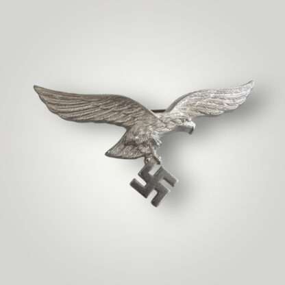 An original WW2 German Luftwaffe Officer's Summer Breast Eagle by Assmann, constructed in aluminium and worn on white summer tunics.