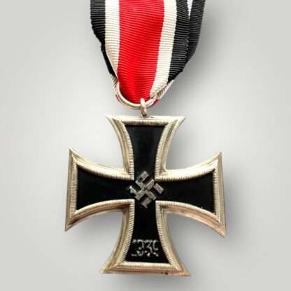 An original Iron Cross EK2 1939 by Meybauer Schinkel, three part contruction with crisp silver frame and original black matt paint finish with nice patina with original long ribbon.