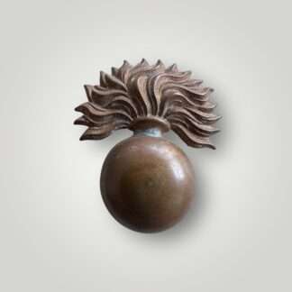 A British Grenadier Guards Victorian EM/NCOs cap badge, constructed in brass