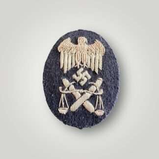 An original Kriegsmarine Advanced Level Judicial Officials sleeve patch, hand embroidered in silver bullion.