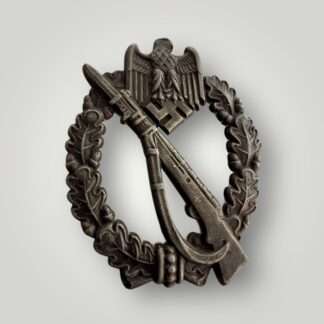 An original Infantry Assualt Badge Bronze by JFS constructed in zinc.