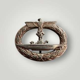 A Kriegsmarine U-Boat badge by Funcke & Brunenghaus. Constructed in zinc with faded gilt finish, with nice patina.