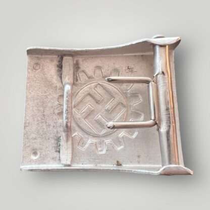 Reverse image of an German Labour Front belt buckle by Overhoft. Constructed in aluminium die struck with a silver wash.