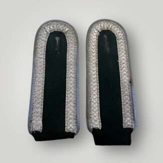 A matching pair of Heer M44 Transport Unterfeldwebel Shoulder Boards, constructed on dark green wool with diamond patterned matt blue/grey tress.