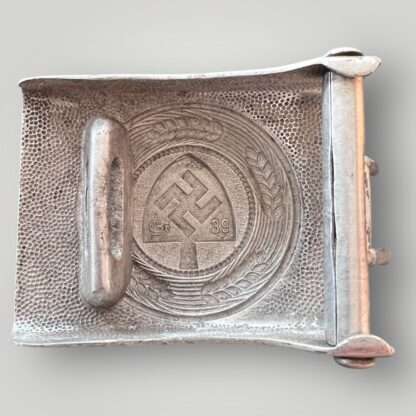 Reverse image of a RAD Belt & Buckle stamped GB for Gustav Brehmer and 39. Constructed in aluminium.