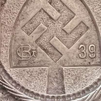 Reverse image of a RAD Belt & Buckle stamped GB for Gustav Brehmer and 39. Constructed in aluminium.