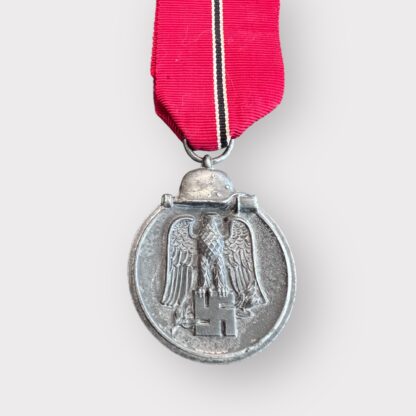 An original Sudetenland medal to commemorate the 1st October 1938, die-struck in bronze measuring 32mm with presentation box.