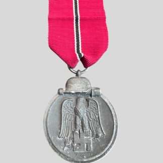 An original WW2 German Eastern Front Medal unknown maker, constructed in zinc complete with suspension ring which is unmarked with a nice long ribbon.