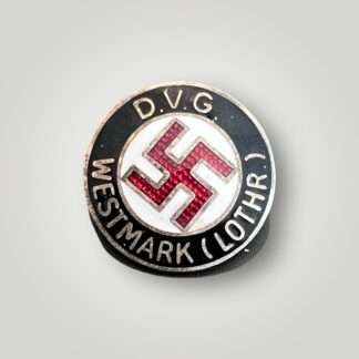 A DVG Westmark (Lothr.) By W.Redo Party Pin (Deutscher Volksgenossen Bund Mitgliedsabzeichen). Constructed in black, red, and white enamel