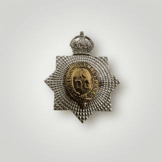 An original 1st King's Dragoon Guards (1st Pattern) circa 1915 -1937, the badge is constructed in white metal and brass.