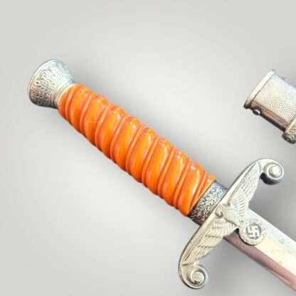 An early Heer Officer’s Dress Dagger By Heer Officer’s Dress Dagger By Alcoso Solingen, complete with scabbard.