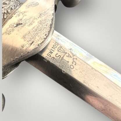 An early Heer Officer’s Dress Dagger By Heer Officer’s Dress Dagger By Alcoso Solingen, complete with scabbard.