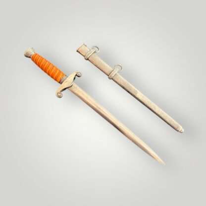 An early Heer Officer’s Dress Dagger By Heer Officer’s Dress Dagger By Alcoso Solingen, complete with scabbard.
