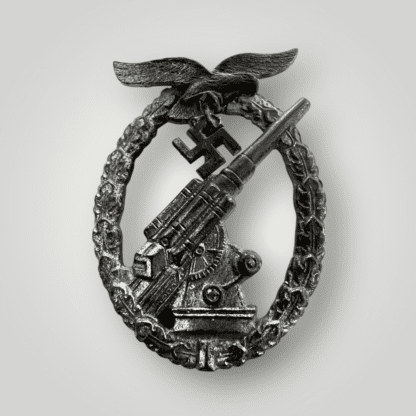 An orginal German WW2 Luftwaffe Flak Badge by E.F. Wiedmann constructed in zinc.