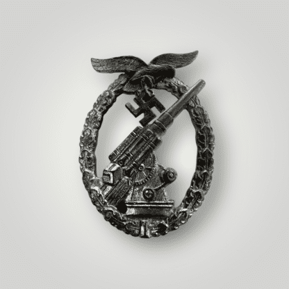 An orginal German WW2 Luftwaffe Flak Badge by E.F. Wiedmann constructed in zinc.