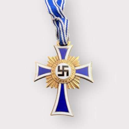 An orginal German Mother's Cross Gold by Ludwig Bertsch with presentation case, two-piece construction bronze gilt and enamel complete with full-length neck ribbon. 