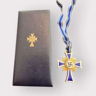 An orginal German Mother's Cross Gold by Ludwig Bertsch with presentation case, two-piece construction bronze gilt and enamel complete with full-length neck ribbon. 