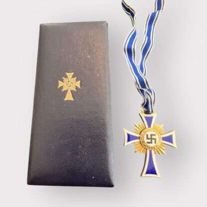 An orginal German Mother's Cross Gold by Ludwig Bertsch with presentation case, two-piece construction bronze gilt and enamel complete with full-length neck ribbon. 