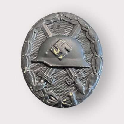 An original WW2 German Wound Badge Black 1939 unknown maker, die-stamped in tombac with nice factory paint finish.