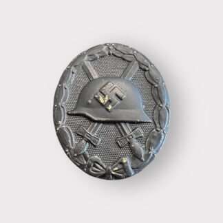 An original WW2 German Wound Badge Black 1939 unknown maker, die-stamped in tombac with nice factory paint finish.