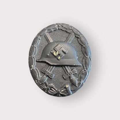 An original WW2 German Wound Badge Black 1939 unknown maker, die-stamped in tombac with nice factory paint finish.
